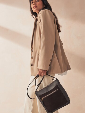 Next Messenger in Brown