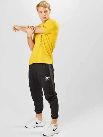 geltona NIKE Standartinis modelis Sportiniai marškinėliai