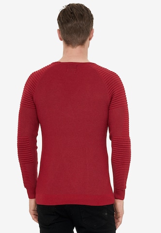 Rusty Neal Figurbetonter Feinstrick Pullover in Rot