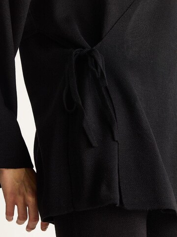 Pantalons de tailleur Bianco Lucci en noir