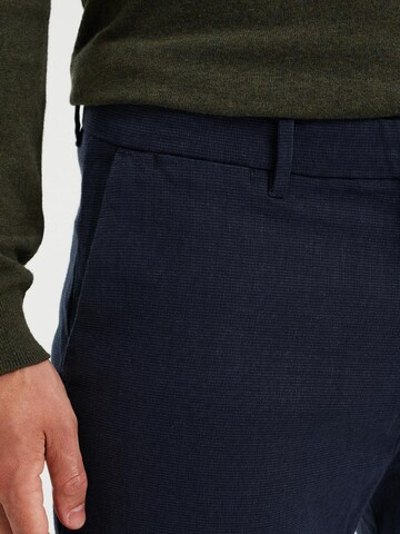 WE Fashion Slim fit Chino trousers in Blue