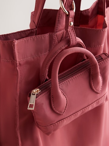 Shopper di Next in rosso