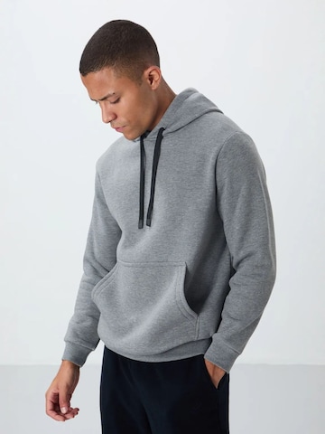 Felpa di Tommy Life in grigio