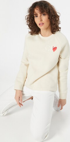 Calvin Klein Collegepaita 'VALENTINES' värissä beige