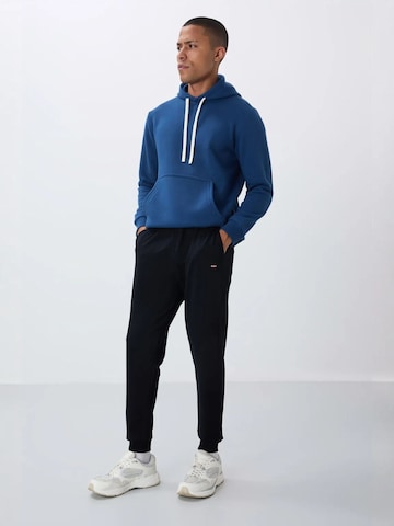 Regular Pantalon Tommy Life en noir