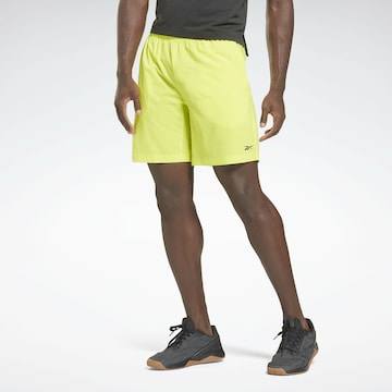 Reebok Sport Workout Pants 'Austin' in Yellow: front