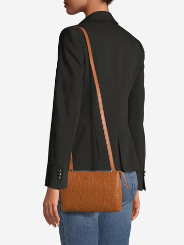 Calvin Klein Crossbody Bag in Brown