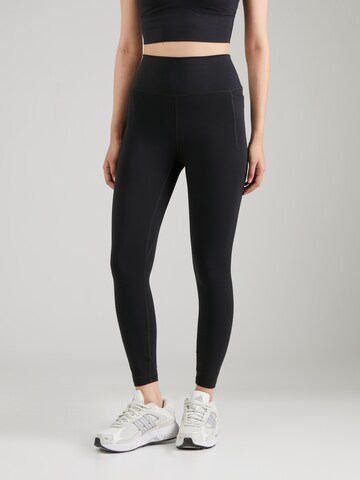 UNDER ARMOUR Skinny Workout Pants 'Meridian' in Black: front