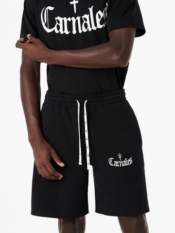 Carnales - Loosefit Pantalón en negro