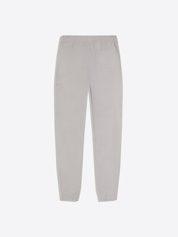 Tapered Pantaloni cargo di Bershka in grigio