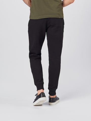 Calvin Klein Jeans Дънки Tapered Leg Панталон в черно