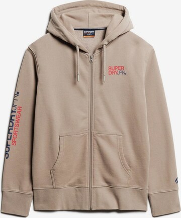 Veste de survêtement Superdry en beige : devant