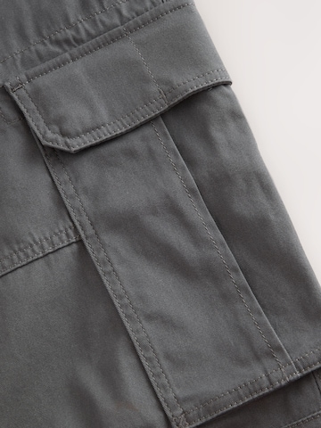 Skinny Pantaloni cu buzunare de la Next pe gri