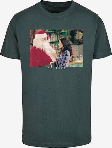 ABSOLUTE CULT T-Shirt 'Friends - Santa Chandler' in Grün: predná strana