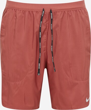 Regular Pantalon de sport 'Flex Stride' NIKE en rouge : devant