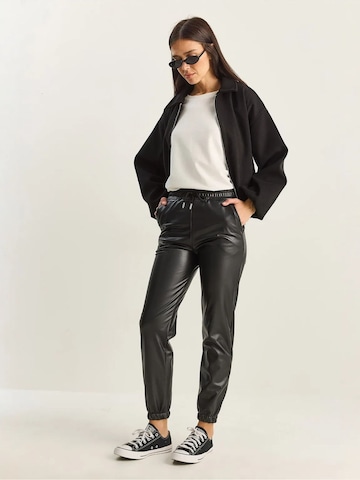 Bianco Lucci - Tapered Calças em preto