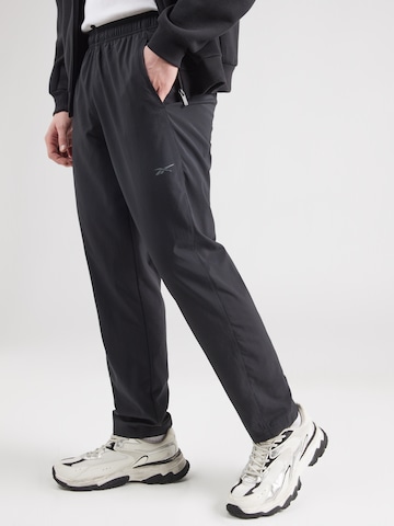 Reebok Regular Sports trousers 'ID TRAIN' in Black: front