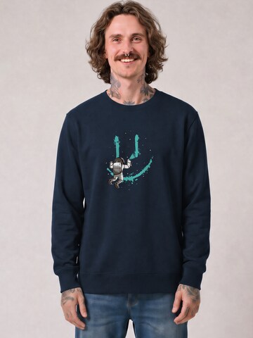 Watapparel Sweatshirt ' Graffiti Astronaut ' in Blauw: voorkant