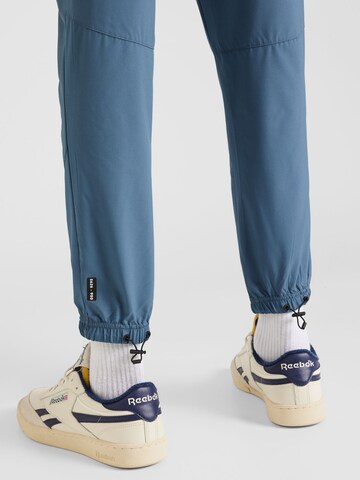 Effilé Pantalon de sport 'Colin' Virtus en bleu