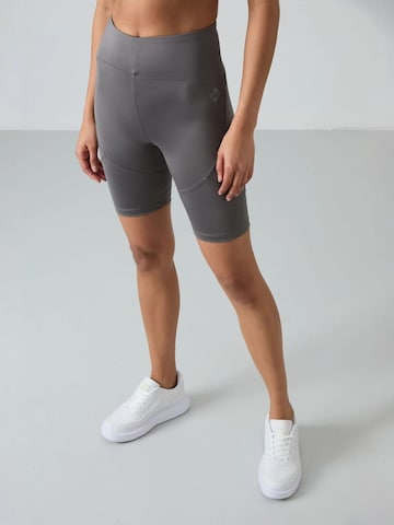 Tommy Life - Tapered Leggings 'Gamaschen' em cinzento