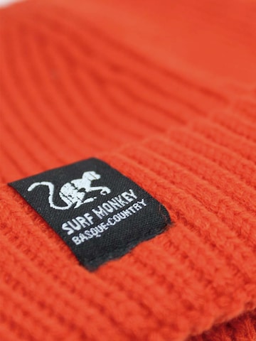 Surf Monkey - Gorra en rojo