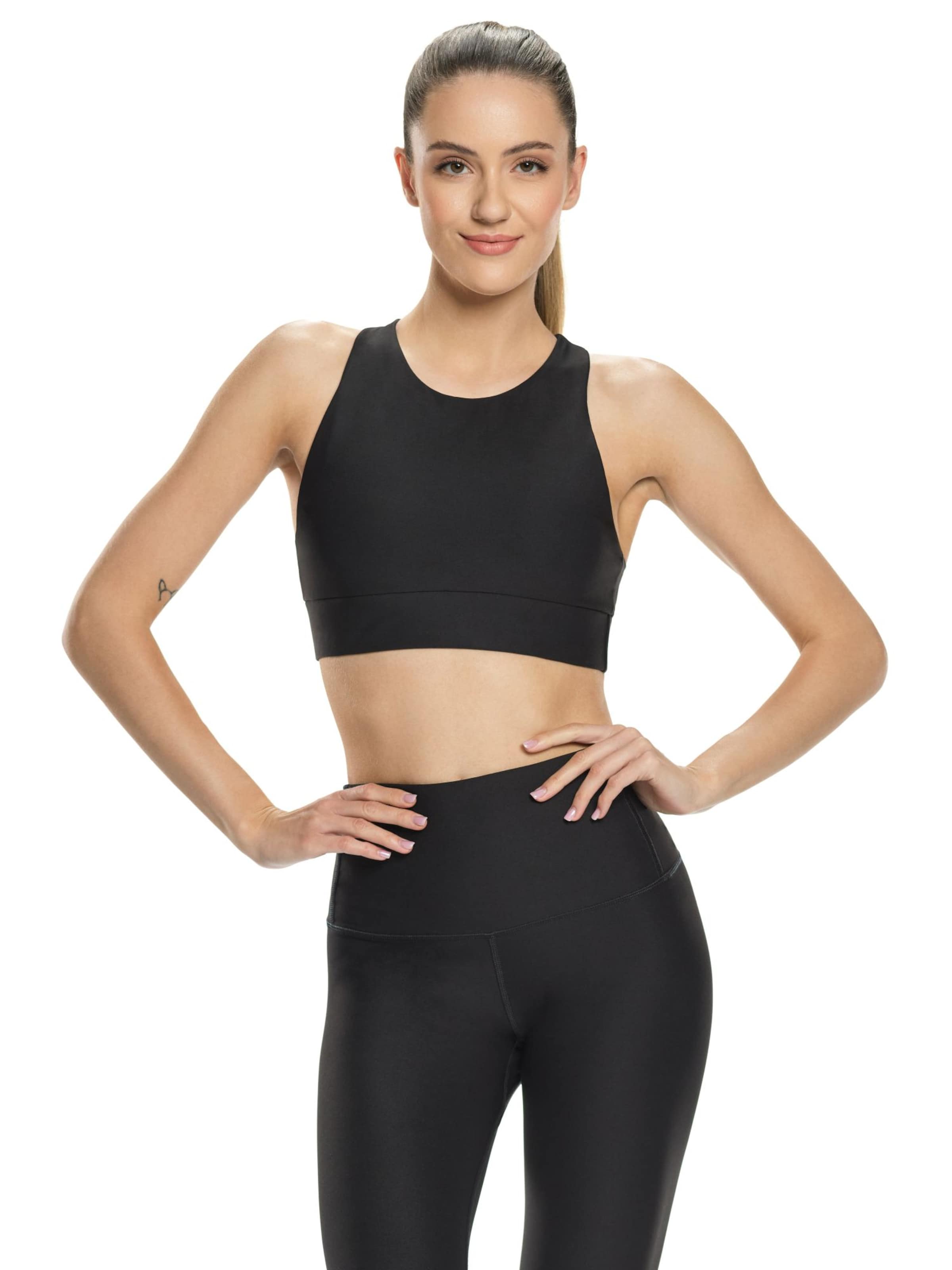 Winshape Bygelfri Sportbehå ' SB103C ' i svart: framsida