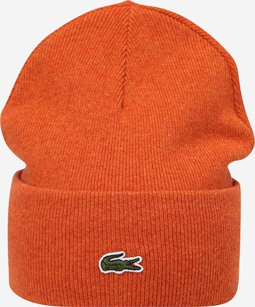 LACOSTE - Gorra en naranja