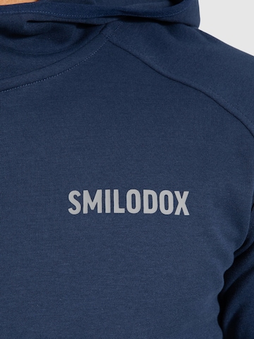Veste de survêtement 'Maison' Smilodox en bleu