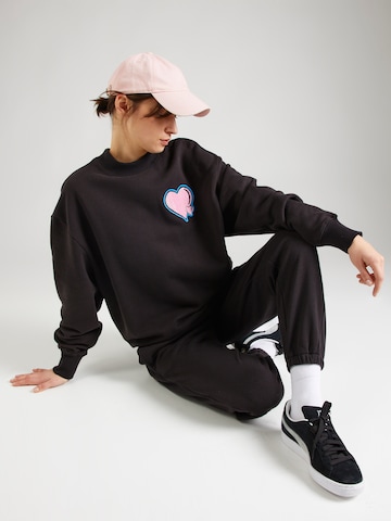 PUMA Sweatshirt 'Whole Lotta Love' in Black