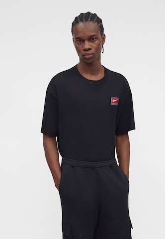 Nike Sportswear Loosefit Hose 'Club Fleece' in Schwarz