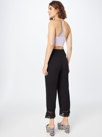 ABOUT YOU Loose fit Pants 'Carlene' in Black