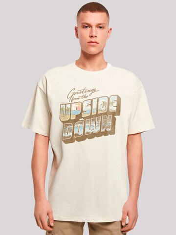 F4NT4STIC Shirt 'Stranger Things Greetings From Upside Down Netflix TV Series' in Beige: voorkant