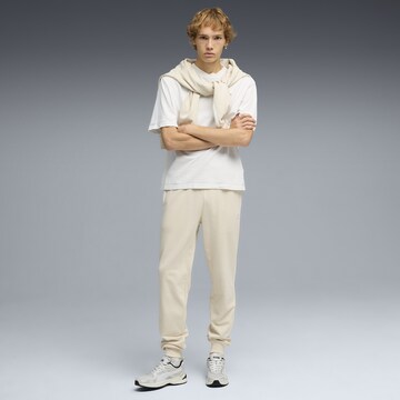 PUMA Tapered Broek 'Essentials' in Beige