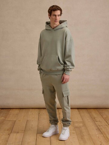 Tapered Pantaloni cargo 'Taylor' di DAN FOX APPAREL in verde