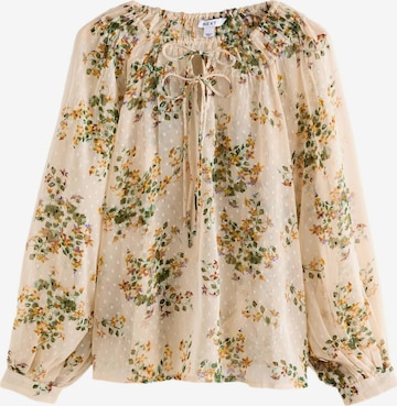 Next Pusero värissä beige: etupuoli