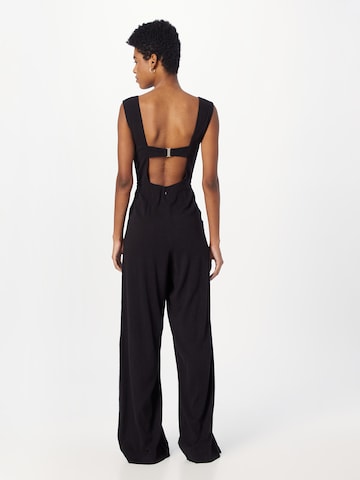 Tuta jumpsuit 'IRIS' di Free People in nero