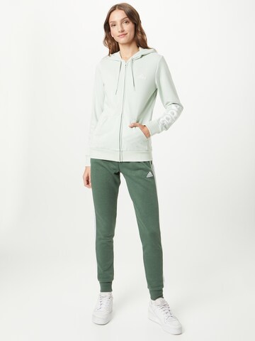 ADIDAS SPORTSWEAR Tapered Workout Pants 'Essentials Fleece 3-Stripes' in Green: front