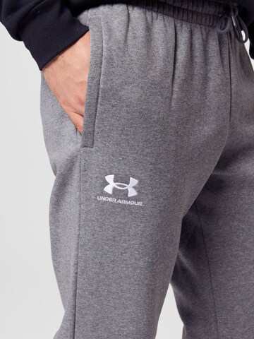 UNDER ARMOUR Tapered Παντελόνι φόρμας 'Essential' σε γκρι