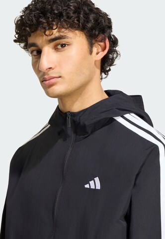 ADIDAS SPORTSWEAR - Chaqueta deportiva 'Essentials' en negro