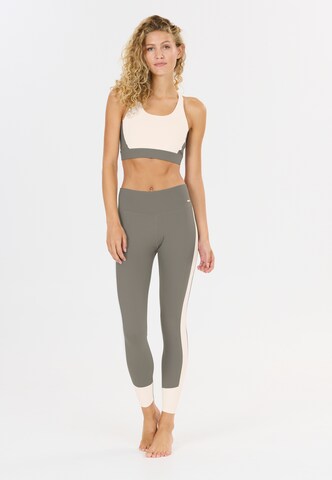 Athlecia Low support Sport bh 'Aspasia' in Groen