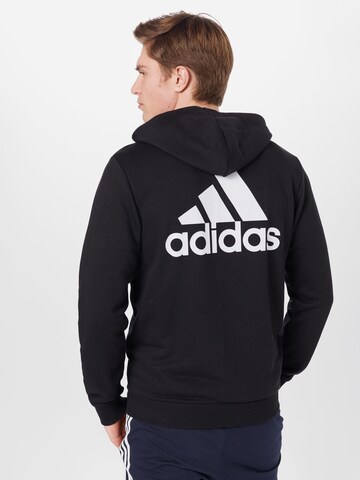 ADIDAS SPORTSWEAR Спортна жилетка с качулка в черно