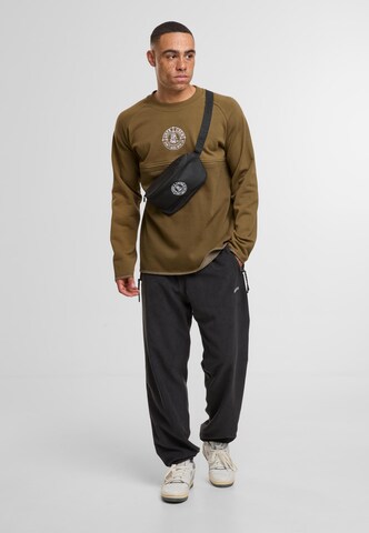 Unfair Athletics Sweatshirt in Green