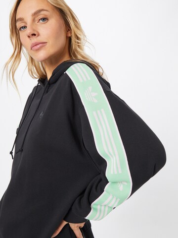 ADIDAS ORIGINALS Sweatshirt 'Loose With Tape Detail' in Schwarz