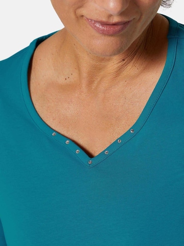 Goldner T-Shirt in Grün