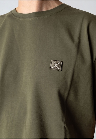 Maglietta di Clean Cut Copenhagen in verde