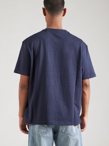 GUESS Bluser & t-shirts i blå