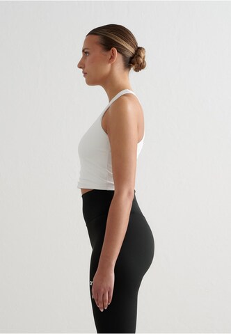 Bustino Reggiseno sportivo 'Essential' di Aim'n in bianco