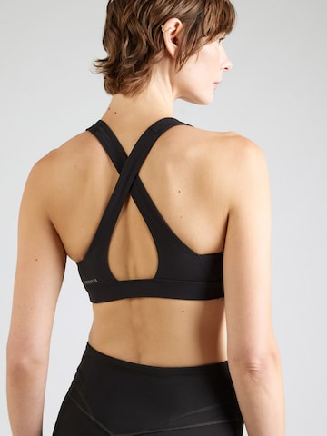PUMA Bustier Urheilurintaliivit värissä musta