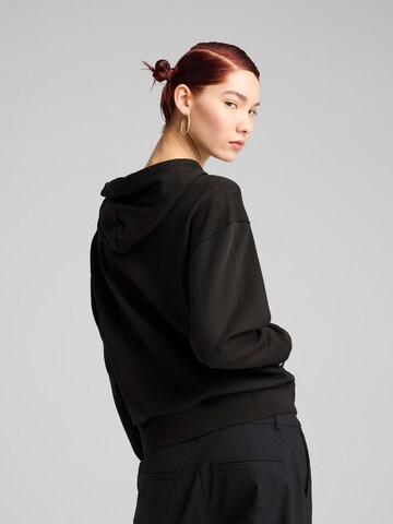 PUMA Sweatshirt 'Ess' in Black