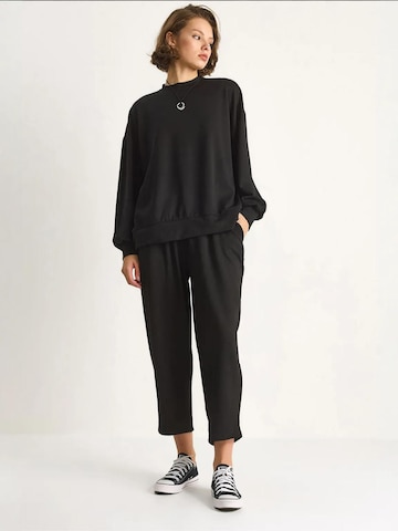 Tuta da jogging di Bianco Lucci in nero